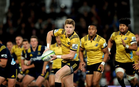 Jordie Barrett and Ardie Savea playing for Hurricanes against Highlanders