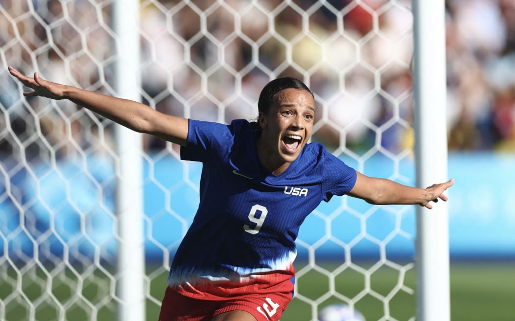 US forward Mallory Swanson celebrates scoring the only goal of the Olympic women's football final in Paris.