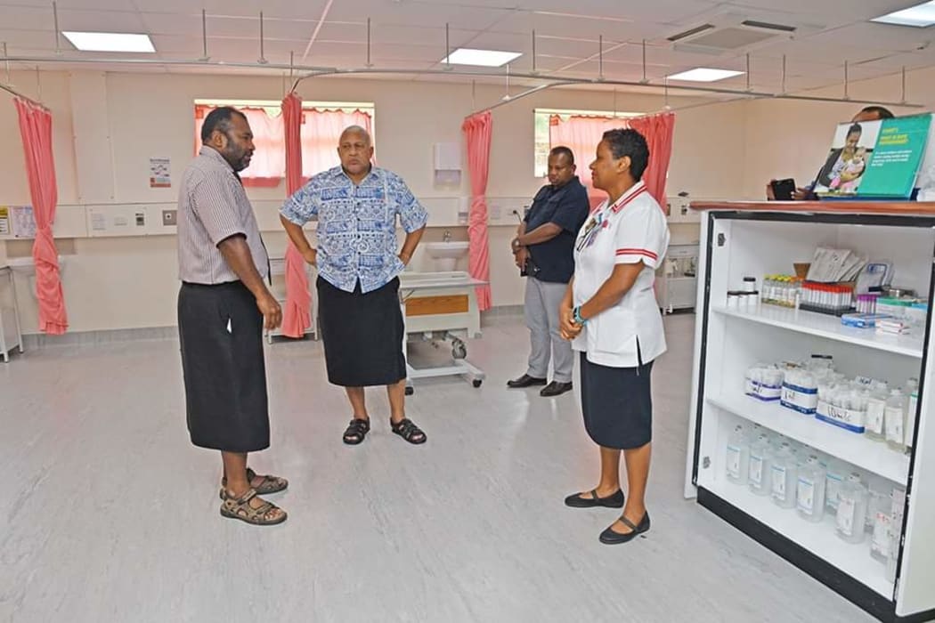 Fijian government officials visit isolation facilities.