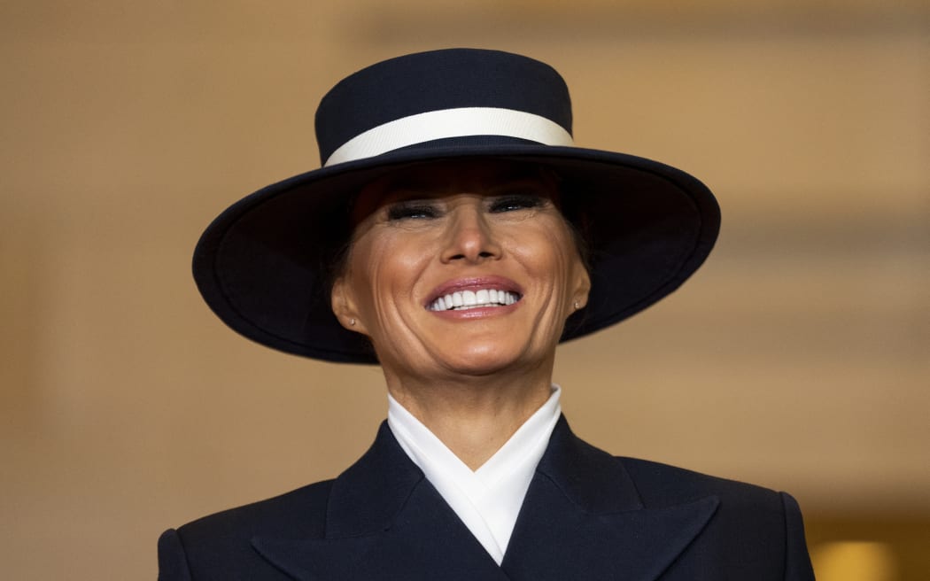 US First Lady Melania Trump looks on as President Donald Trump delivers remarks in Emancipation Hall during inauguration ceremonies at the US Capitol in Washington, DC, on 20 January, 2025.