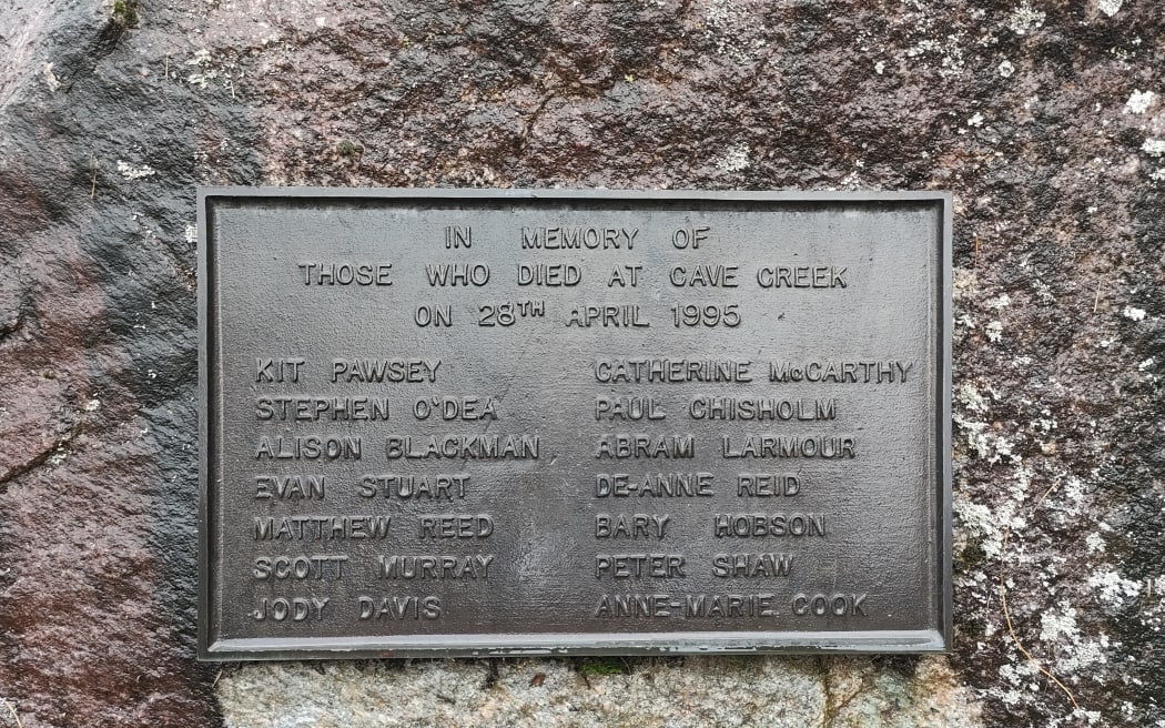 A plaque near Cave Creek showing the names of the thirteen Tai Poutini Polytechnic students and the Department of Conservation worker who died when the viewing platform collapsed on April 28, 1995.