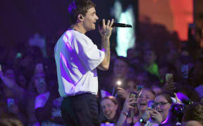 03 July 2019, Berlin: The singer Liam Payne performs at the HUGO label show in the Halle im Wriezener Karree. The collections for Spring/Summer 2020 will be presented at Berlin Fashion Week. Photo: Jens Kalaene/dpa (Photo by JENS KALAENE / DPA / dpa Picture-Alliance via AFP)