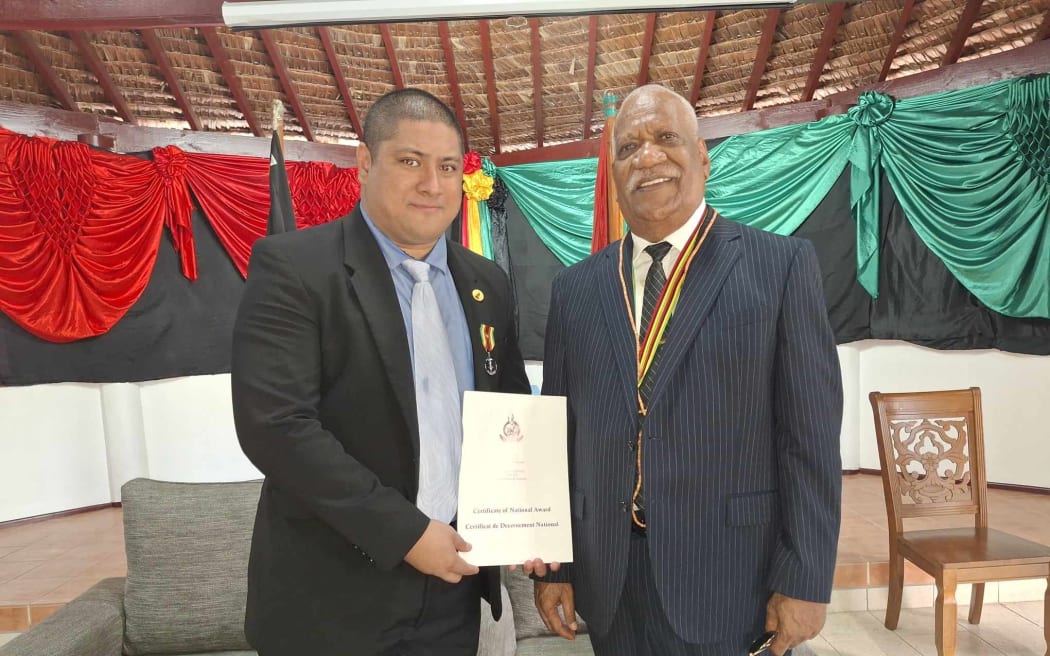 Vanuatu President Nikenike Vurobaravu, right, and Broderick Mervyn.