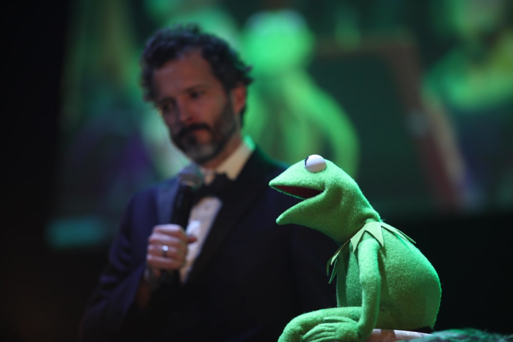 Bret McKenzie and Kermit onstage at The Jim Henson Retrospectacle
