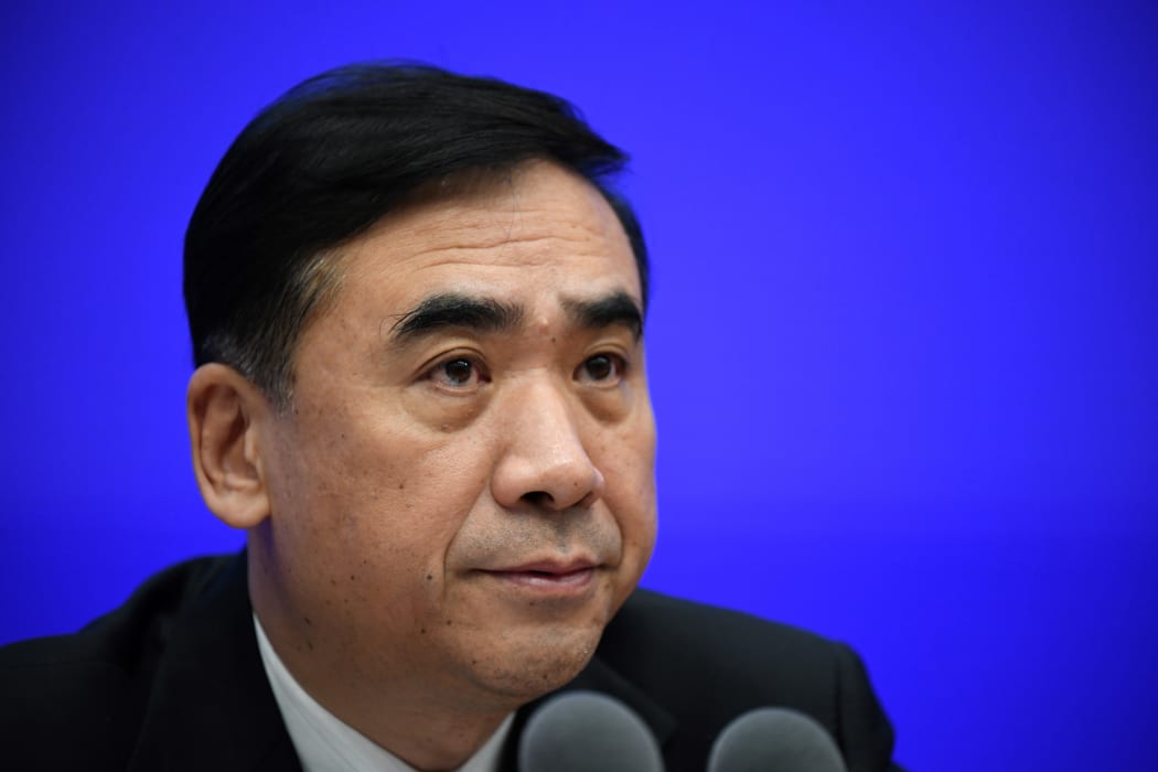 China's National Health Commission vice minister Li Bin speaks during the State Council Information Office press conference.
