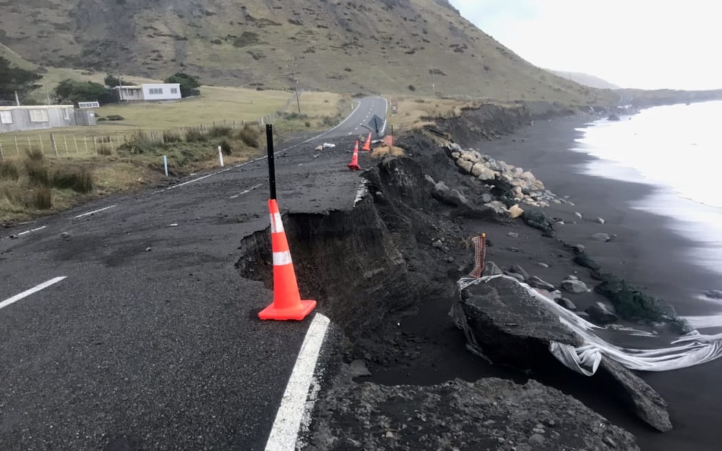 The road at Cape Palliser on the South Wairarpa Coast road damaged by a southerly swell at the weekend.