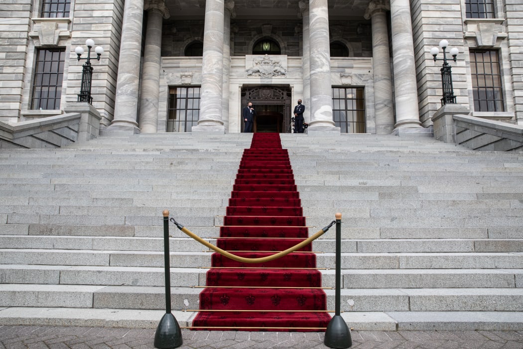 A red carpet runs up Parliament's front steps