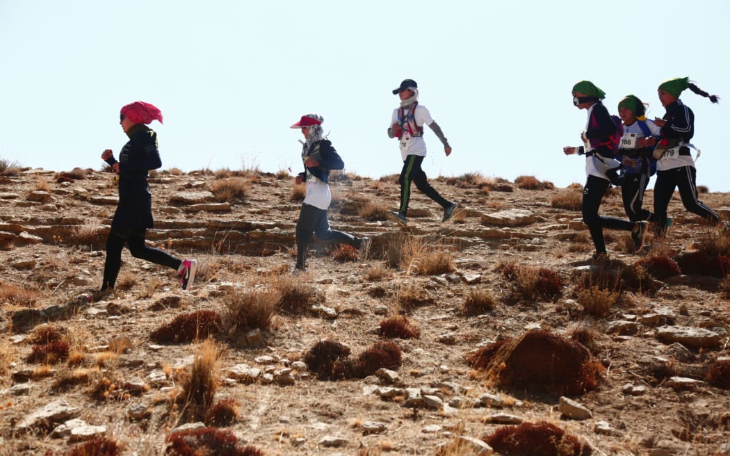 Women take part in the Afghanistan Marathon in Afghanistan.