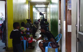 Some patients waiting to see Fred Hollows eye clinic