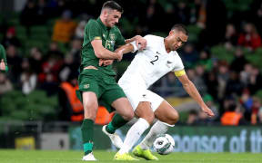 All Whites captain Winston Reid and Troy Parrott of Ireland