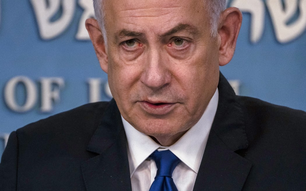 Israeli Prime Minister Benjamin Netanyahu speaks during a joint press conference with the German Chancellor after their meeting in Jerusalem on March 17, 2024. Netanyahu said on March 17 that any Gaza peace deal that weakens Israel and leaves it unable to defend itself against hostile neighbours would be unacceptable. (Photo by Leo Correa / POOL / AFP)