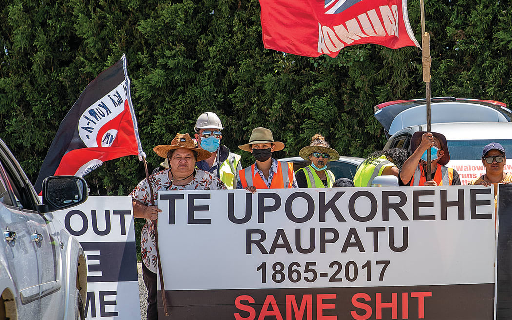 Members of Te Ūpokorehe protest their inclusion in the Whakatōhea Treaty settlement at the initialing of the settlement in December.