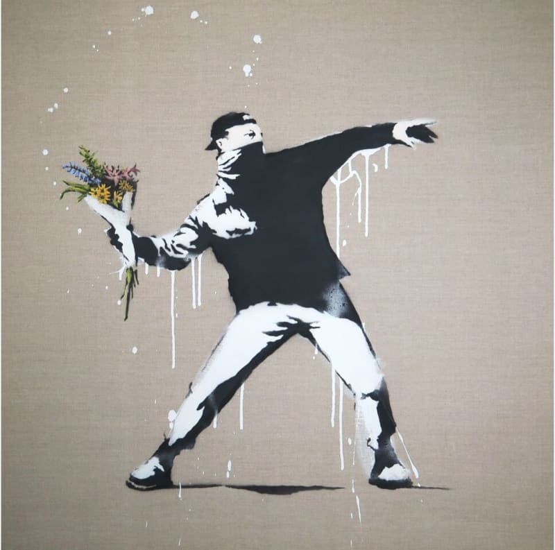 A black and white painting of a figure in a face covering throwing a bunch of flowers as if it were a grenade.