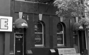 Black and white photo of the Empire Hotel in Dunedin