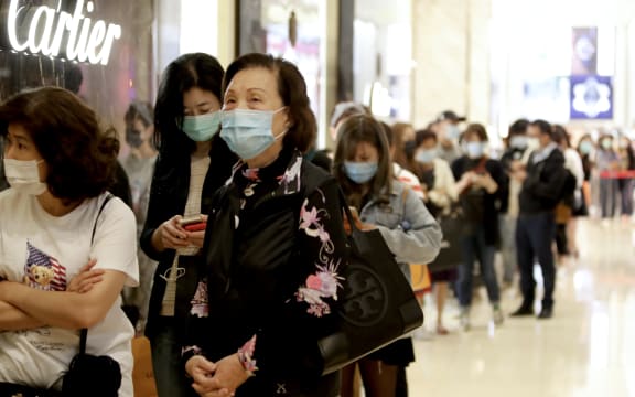 People wearing masks in Taipei City, Taiwan, on November 5, 2020.The island's economy has seen a rapid upward shift in its growth through the summer and early fall, according to news reports.
