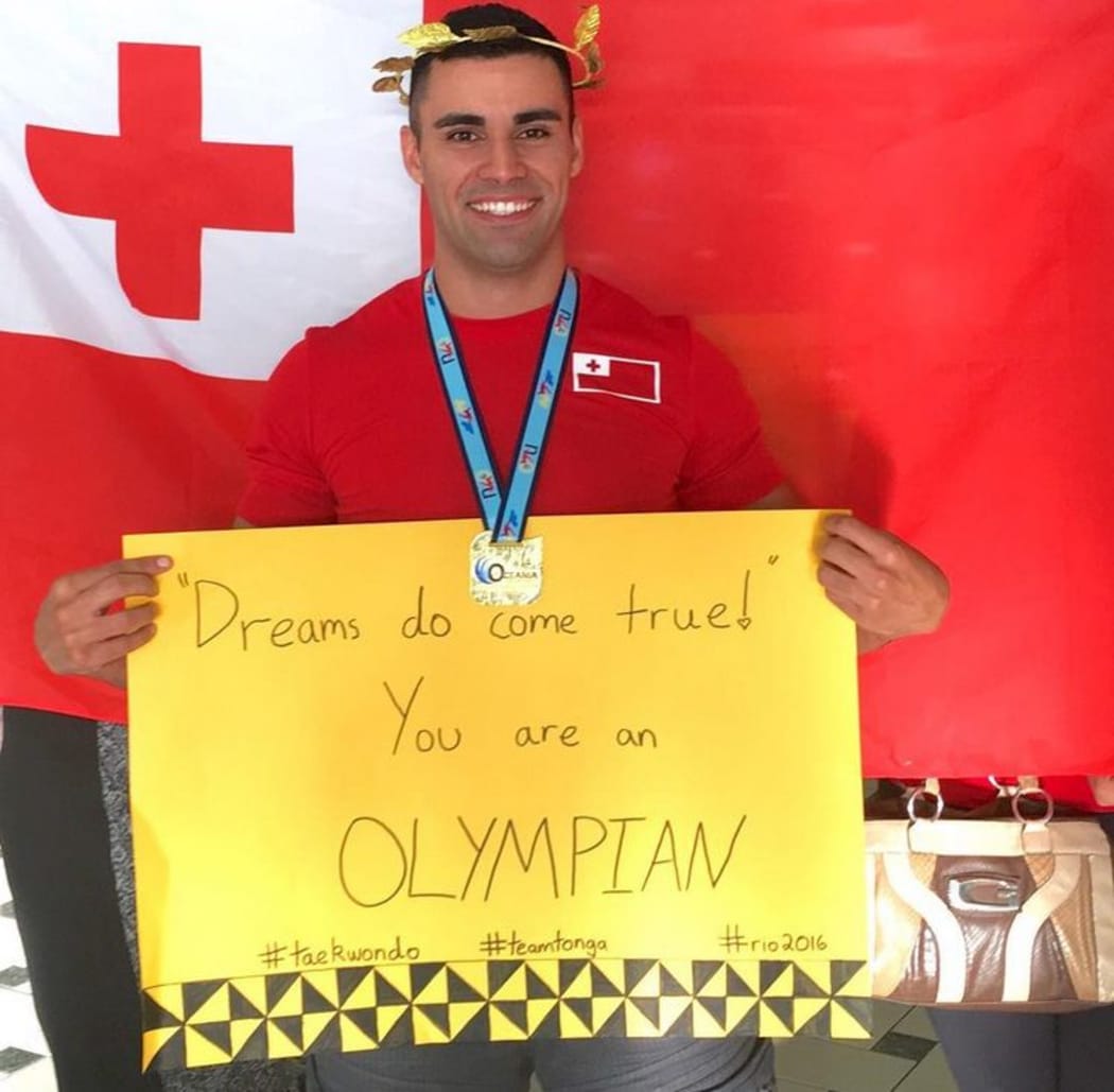 Tonga's Pita Taufatofua celebrates qualifying for the Rio Olympics.