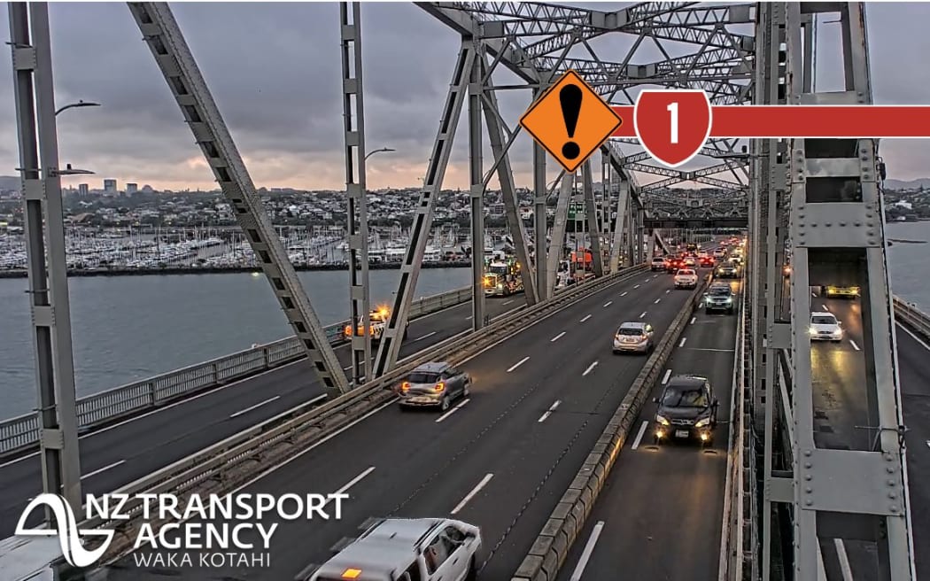 A piece of roadworks equipment has broken down on the Auckland Harbour Bridge, delaying reopening lanes after an overnight closure.