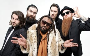 Skindred is a Welsh band that fuses heavy metal with other genres, most notably reggae.