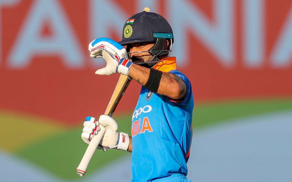 India skipper Virat Kohli leaves the field because of sun strike.