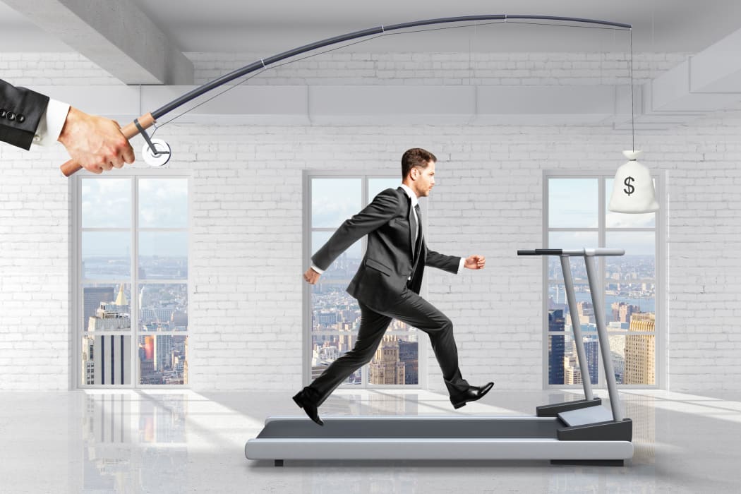 51533453 - profit-seeking concept with businessman running on a treadmill for a bag of money hanging on a fishing tackle.