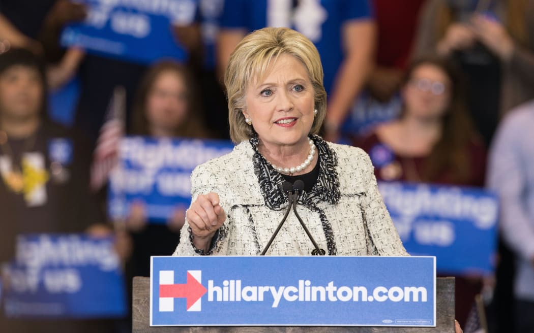 Hillary Clinton addresses a rally in Columbia, South Carolina following her sweeping victory in the state's Democratic primary.