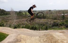 A rider gets some air on the advanced jump line.