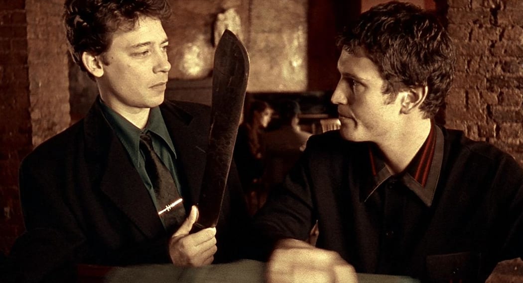 Still from the 1998 British gangster film Lock Stock and Two Smoking Barrels featuring Dexter Fletcher and Nick Moran