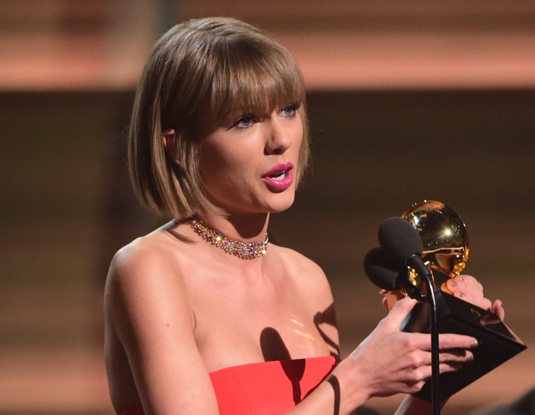 Singer Taylor Swift accepts the award for the Album of the Year onstage during the 58th Annual Grammy music Awards in Los Angeles February 15, 2016.