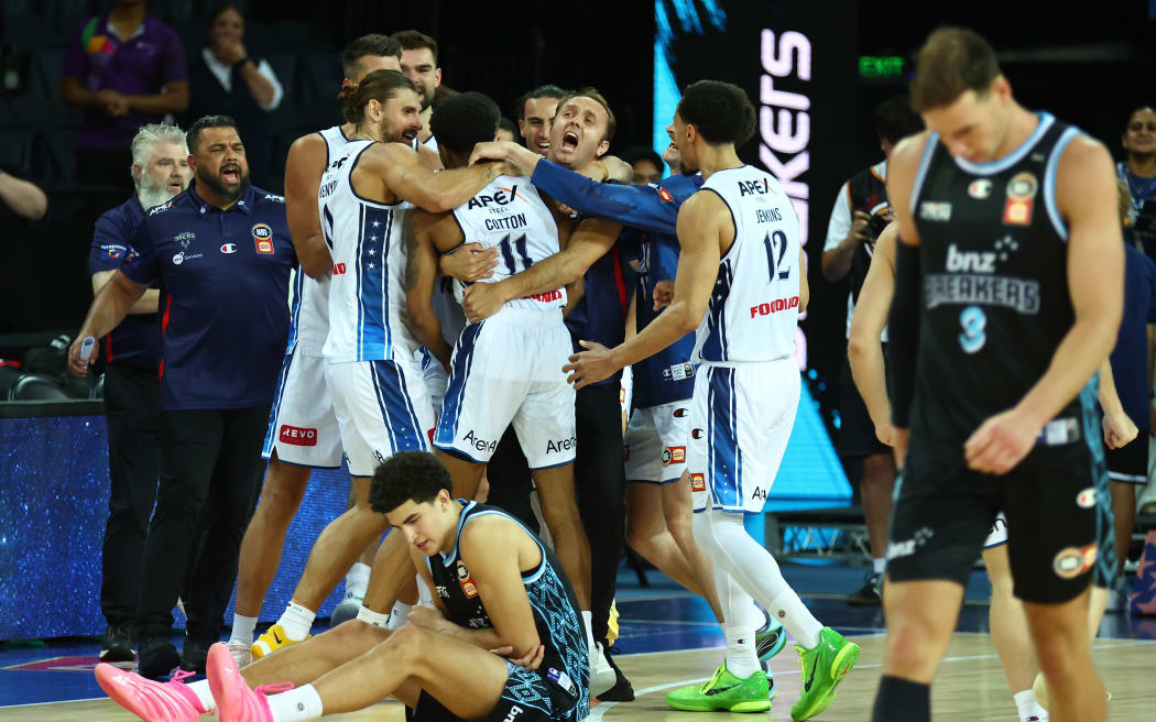 Adelaide 36ers celebrate victory over the New Zealand Breakers.