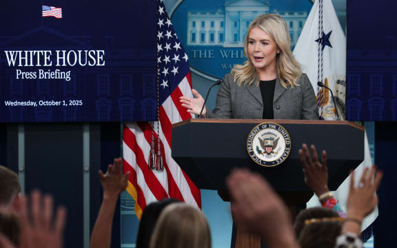 WASHINGTON, DC - OCTOBER 01: White House Press Secretary Karoline Leavitt takes questions from reporters during the daily press briefing in the Brady Press Briefing Room at the White House on October 01, 2025 in Washington, DC. Joined by U.S. Vice President JD Vance, Leavitt discussed the federal government shutdown, after Congress and the White House failed to reach a funding deal by the October 1 deadline and halted U.S. government services for the first time in nearly seven years.   Alex Wong/Getty Images/AFP (Photo by ALEX WONG / GETTY IMAGES NORTH AMERICA / Getty Images via AFP)