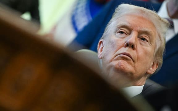 US President Donald Trump listens during an event about weight-loss drugs in the Oval Office of the White House in Washington, DC on November 6, 2025.