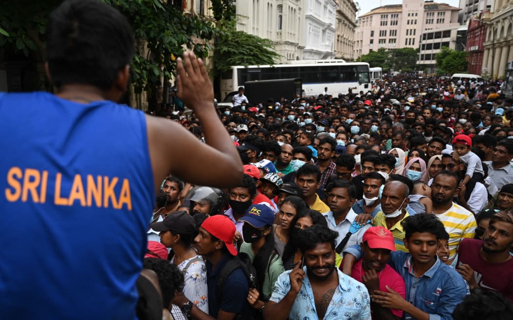 People crowd to visit Sri Lankan President Gotabaya Rajapaksa's official residence in Colombo on 11 July 2022, after it was overrun by anti-government protesters.