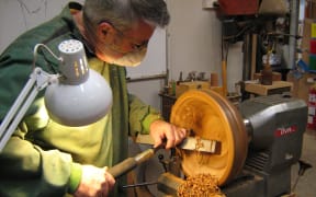Jim Lowe working at his lathe