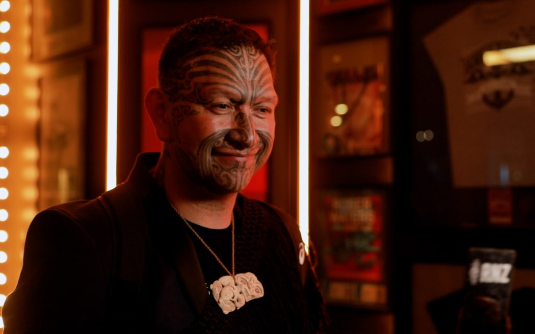 Rob Ruha, winner of the 2022 APRA Silver Scroll Award, along with Kaea Hills, Te Amorutu Broughton, Ainsley Tai, Dan Martin, Whenua Patuwai for their track '35'.