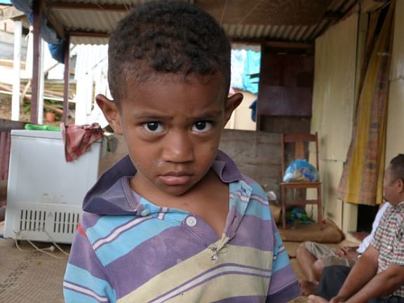 Young boy at home in Suva squatter camp