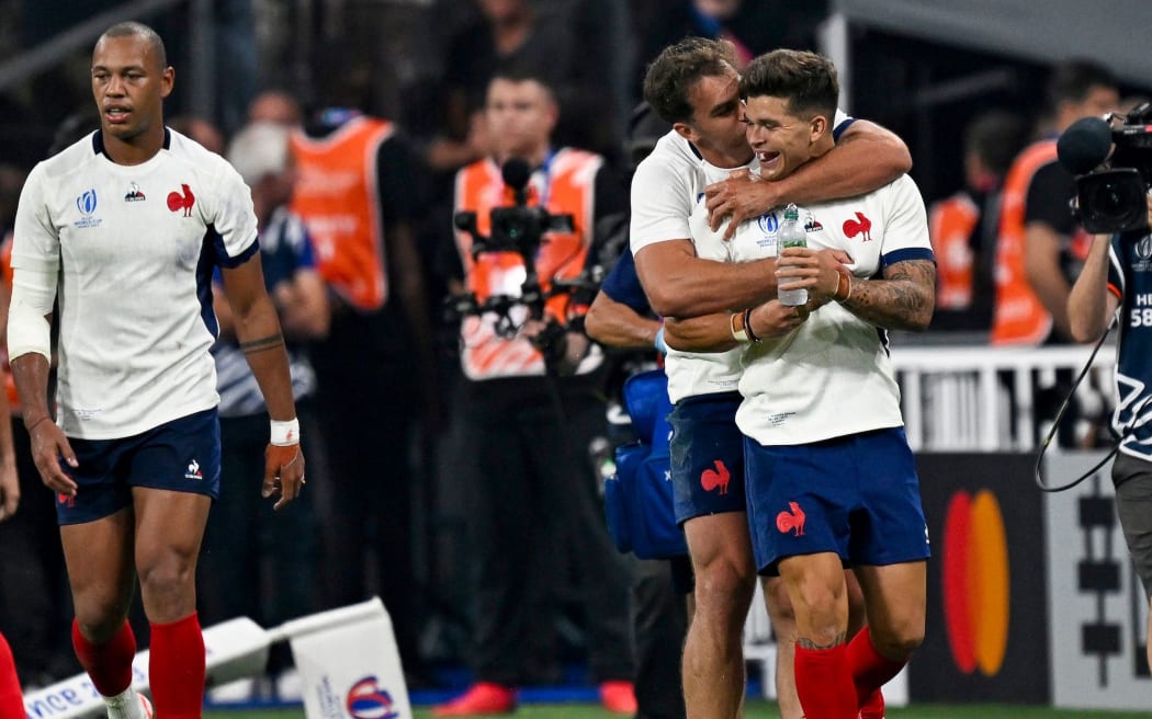 Damian Penaud of France celebrates his try with Matthieu Jalibert against the All Blacks at the Rugby World Cup in Paris.