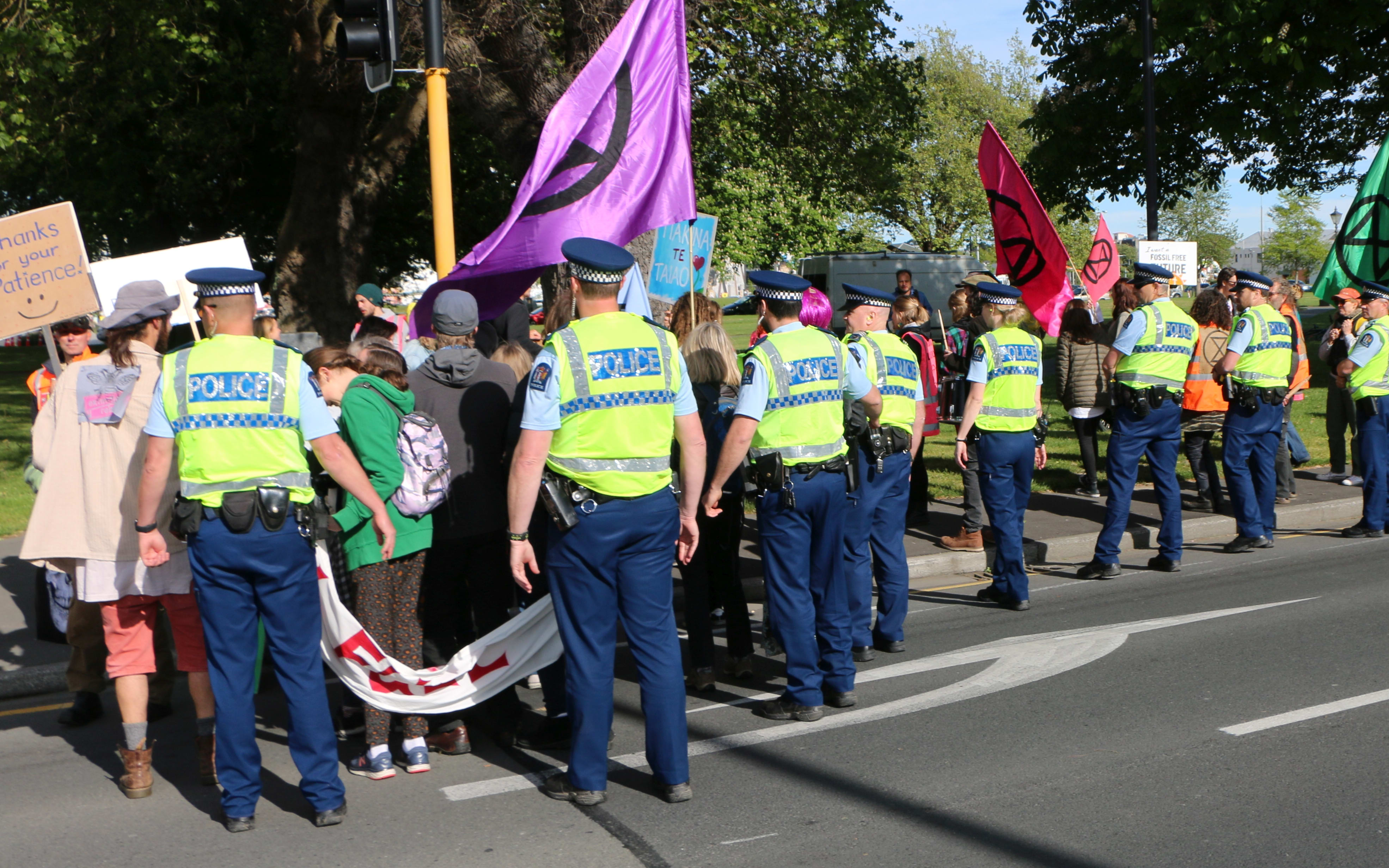 Police move Extinction Rebellion protesters off the street at Latimer Square, Christchurch.