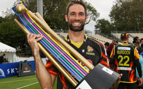 Wellington allrounder Grant Elliott with the domestic Twenty20 trophy.