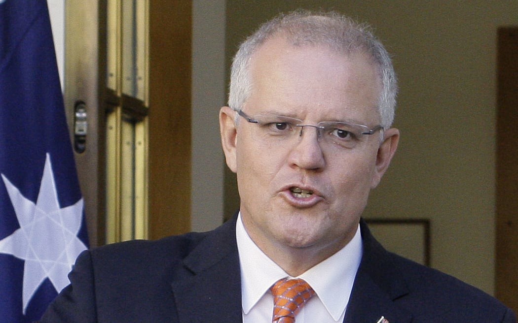 Australian Prime Minister Scott Morrison addresses the media at Parliament House in Canberra, 13 February 2019.