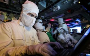 Sailor in the operations room of HMS Richmond