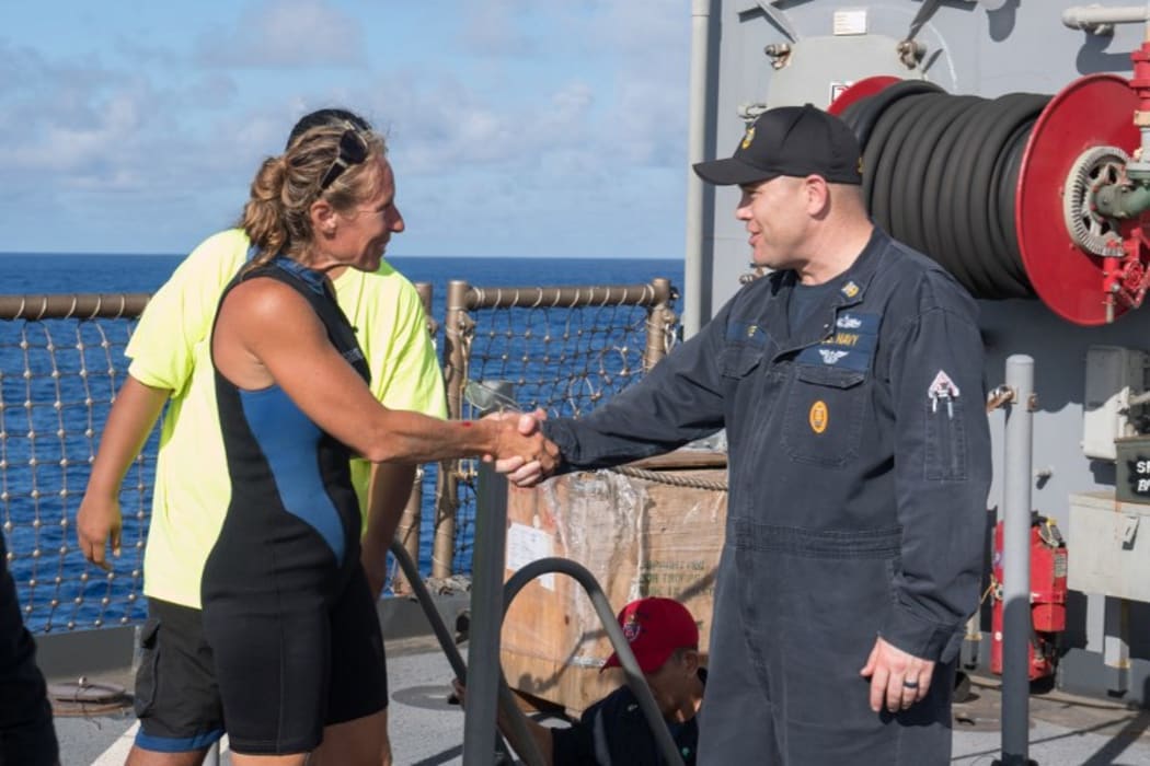 USS Ashland (LSD 48) Command Master Chief Gary Wise welcoming aboard Jennifer Appel.