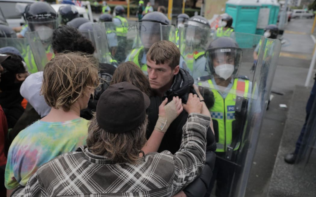 Protesters clash with police on day 23 of the occupation.