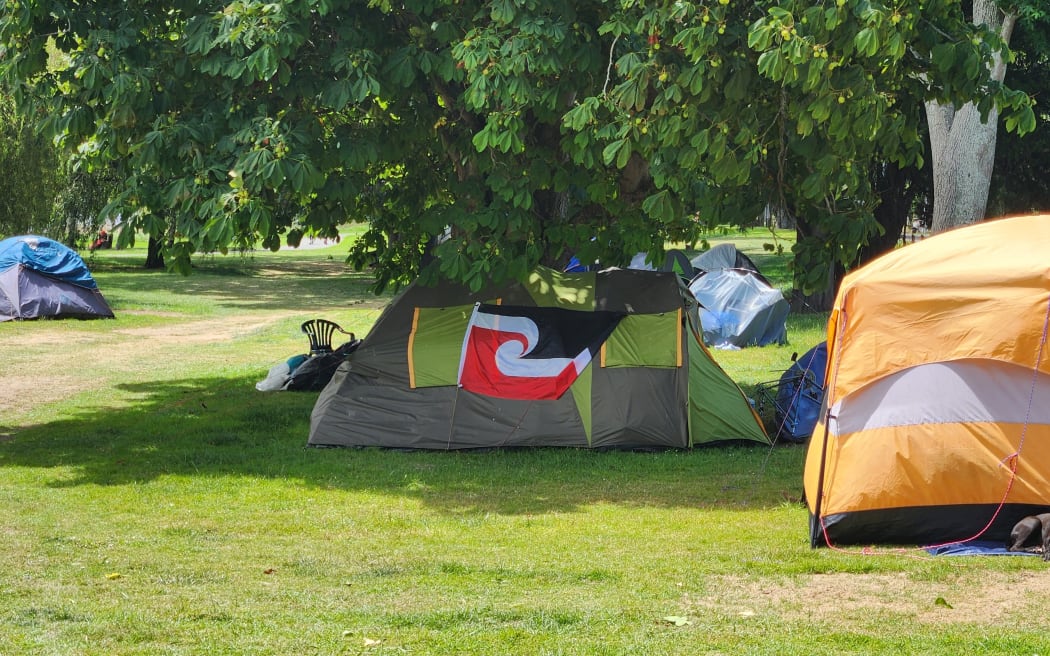 The de facto encampment for people experiencing homelessness at Whanganui's Anzac Parade freedom camping site in December 2024, shortly before campers were evicted by Whanganui District Council.