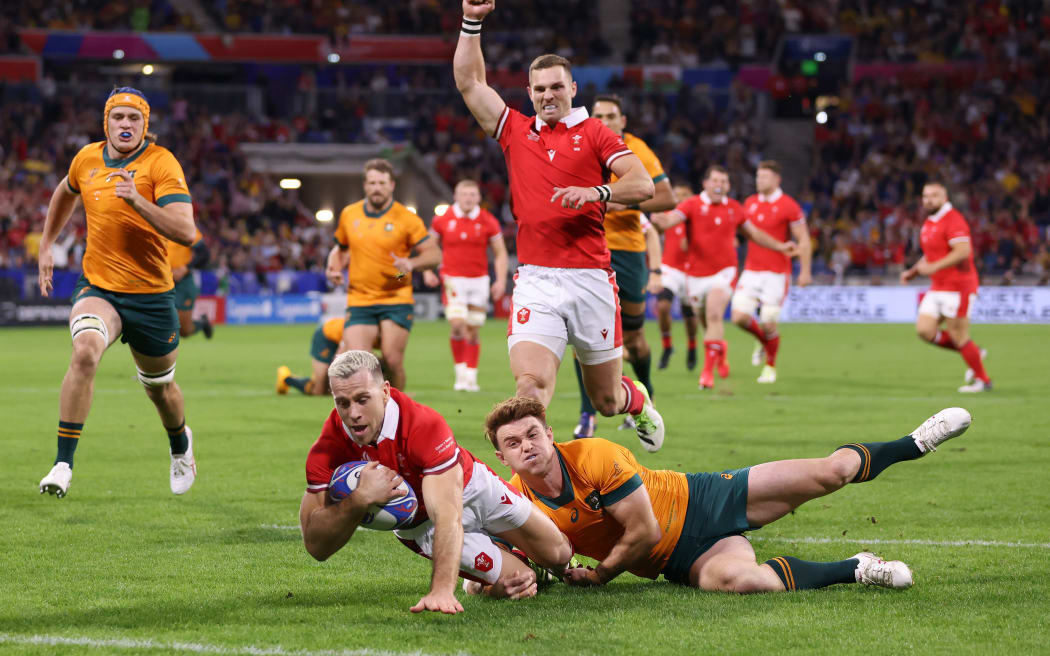 Gareth Davies of Wales scores the team's first try during the Rugby World Cup France 2023 match between Wales and Australia at Parc Olympique on 25 September, 2023 (NZ time) in Lyon, France.