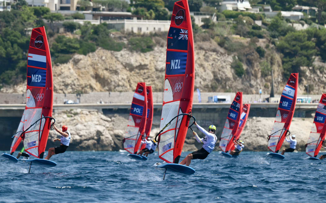 New Zealand's Josh Armit competes in Race 3 of the men’s IQFoil windsurfing event during the Paris 2024 Olympic Games sailing competition at the Roucas-Blanc Marina in Marseille on July 30, 2024. (Photo by Christophe SIMON / AFP)