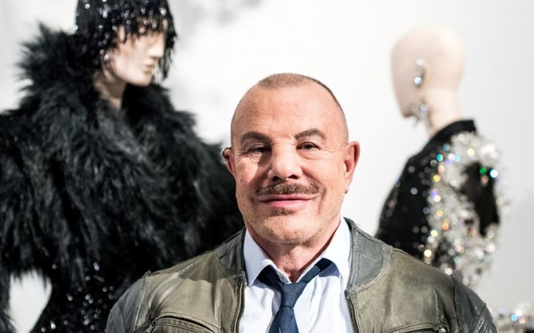 (FILES) In this file photo taken on February 26, 2019, French fashion designer Thierry Mugler poses during the presentation of his exhibition "Couturissime" at the Montreal Museum of Fine Arts.
