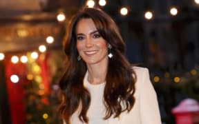 Britain's Catherine, Princess of Wales smiles as she arrives to attend the "Together At Christmas" Carol Service" at Westminster Abbey in London on December 8, 2023. The event will be broadcast as part of 'Royal Carols: Together At Christmas', a special programme, airing at 7:45pm on ITV1 and ITV X on Christmas Eve. (Photo by Chris Jackson / POOL / AFP)