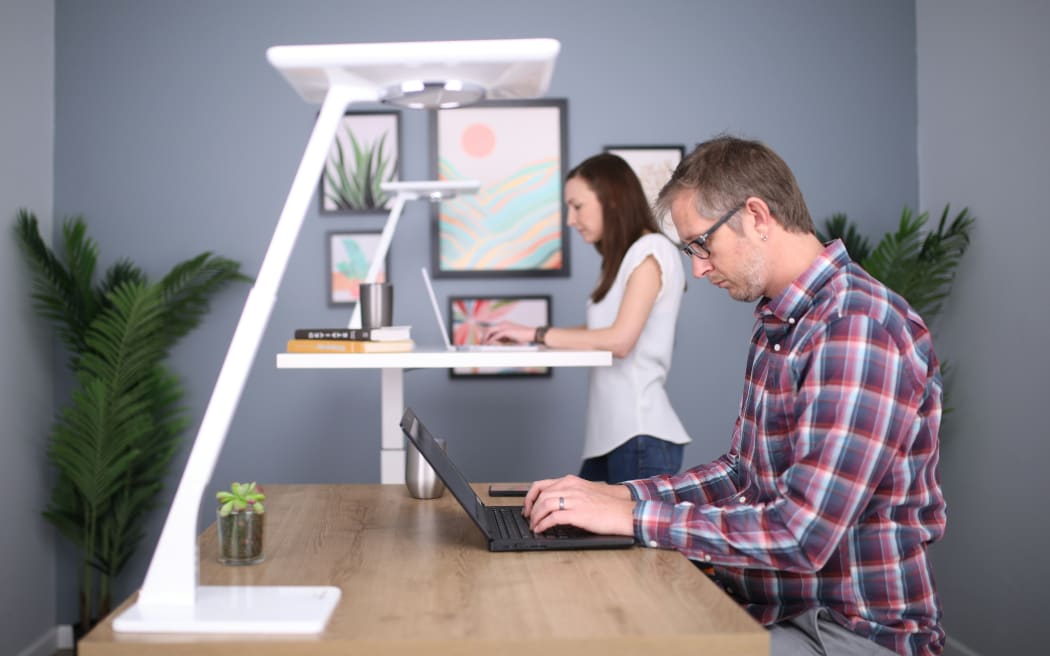 Worker at a  standing desk