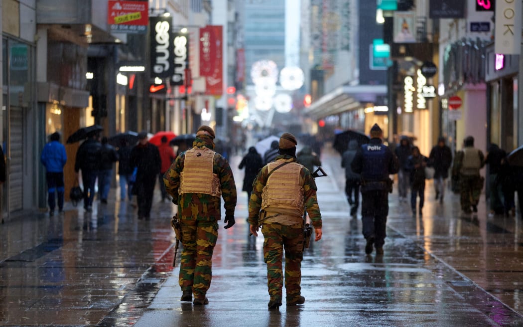 Police and military officers patrolling in central Brussels on Saturday.