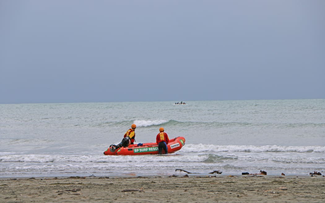 Surf life savers helping with search in Sumner.